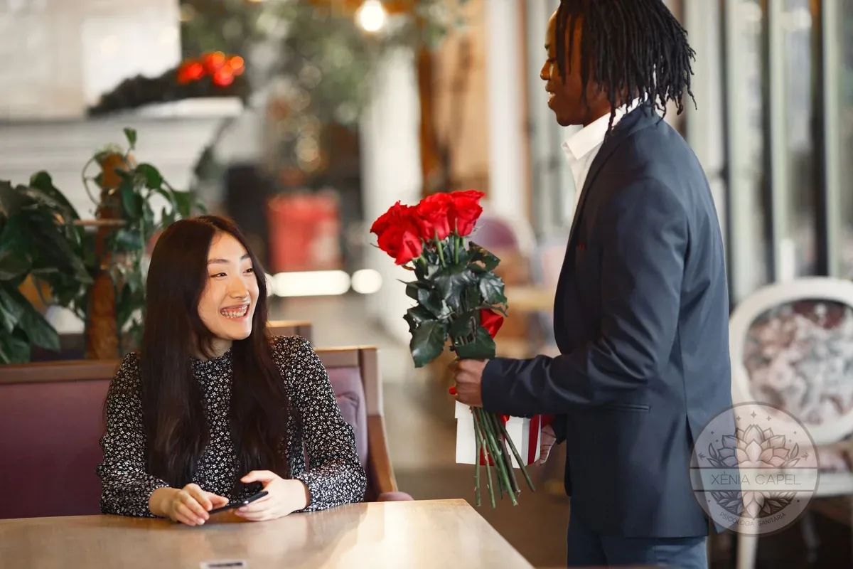 Love bombing: a man offers a large bouquet of roses and a gift, an over-the-top gesture typical of love bombing